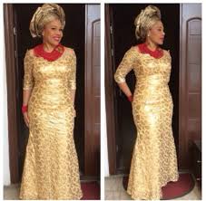 Be Inspired To Get Glamorous Wdn Chic On Trend Aso Ebi Styles Lace Dress Styles Nigerian Outfits Aso Ebi Styles