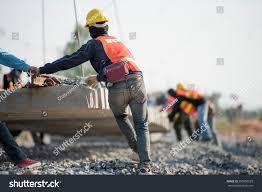 Construction Worker In Construction Site Safety Uniform Sponsored Sponsored Work Construction Site Safety Occupational Health And Safety Workplace Injury