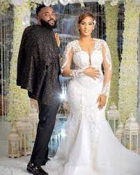 A Sophisticated Wedding Infused With Haitian Culture In New Rochelle Ny Munaluchi Bride Munaluchi Bride Sophisticated Wedding Purple And Gold Wedding