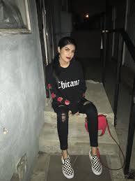 Black And Grey Checkered Slip On Vans Evettexo Chicana Shirt Black Distressed Jeans Black And White Checkered Slip On Vans Instagram Distressed Black Jeans Checkered Vans Outfit Black Vans Outfit