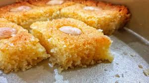 Basbousa Famous Middle Eastern Dessert Traditional Turkish Sweet Easy Eggless Semolina Cake Yout Turkish Desserts Middle Eastern Desserts Semolina Cake