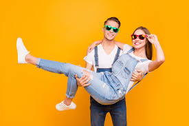 A friday night funkin' (fnf) mod in the girlfriend category, submitted by volatilemask. Young Cute Beautiful Couple Boyfriend Carrying Girlfriend In His Arms Wearing Spectacles Over Yellow Background Isolated Stock Photo Adobe Stock