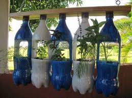 Spoon or shovel for potting soil. 15 Diy Plastic Bottle Planters That You Haven T Seen Before