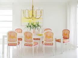 Create an inviting atmosphere with new living room chairs. Pink And Orange French Dining Chairs With White Art Deco Dining Table Hollywood Regency Dining Room