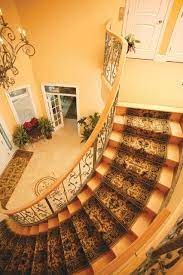 Consider striped carpet for stairs. How To Get Your Stair Runners Right