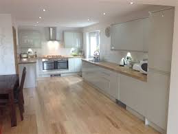 The high gloss black kitchen the high gloss black kitchen features a slab style door in a high gloss finish that provides a truly contemporary looking kitchen. Irving Property Kitchens Kitchen Inspirations Kitchen Style Trendy Kitchen