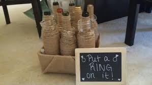 I Made This Ring Toss Game For An Engagement Party With Wine Bottles Twine And Shower Rings Very Easy And Alot O Ring Toss Game Ring Toss Engagement Party