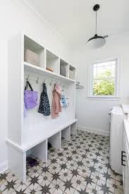 Laundry rooms and mudrooms are frequently located together at the back entrance of the home. Combination Mudroom Laundry Room Design Ideas