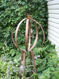10 Recycled Garden Art Ideas Most Incredible And Stunning Recycled Garden Art Recycled Garden Garden Art Projects