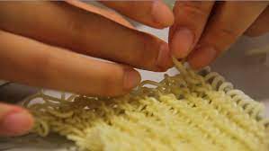 When the pasta is al dente, scoop out and reserve a mugful of the cooking. Knitting Noodles Cynthia Delaney Suwito