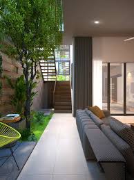 4 Homes That Feature Green Spaces Inside With Courtyards Terrariums In 2020 Indoor Courtyard Courtyard Design Interior Garden