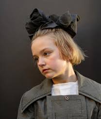 Four black children in yard