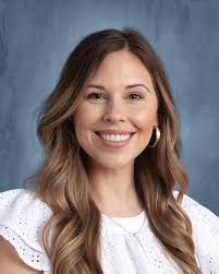 Her grandparents helped build the school, her mom Sandy Zylstra Coonerty  graduated in 1978. Her Uncle Dave Zylstra and Aunts Linda Van Bladel  Zylstra and Jane Zylstra have taught there. Two of