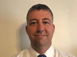 Enfield Police Chief Holland Is A Veteran, Volunteers, Helps Others