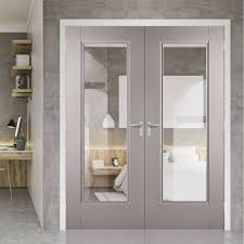 Eindhoven Grey Primed Internal Door Pair With Clear Safety Glass Lifestyle Image Glazed Contemporary Internal Doors Internal Doors Interior Glazed Doors