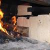 It's relatively easy to replace the firebricks in a wood burning stove. 1