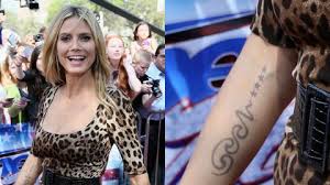 Heidi klum and seal are no more, which should come as no surprise as it's been almost seven years since the couple finalized their divorce. Moving On Heidi Proves New Romance Is For Keeps By Removing Seal Tattoo 9celebrity