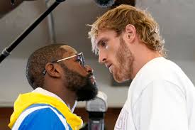 Floyd mayweather, left, and and logan paul, right, face off during a press event, thursday, june 3, 2021, in miami beach, fla. Wnrpx3dlsxjrjm