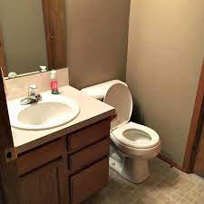 The space went from dark and dated to bright and modern, for around $500! Half Bathroom Remodel Inspiration For Moms