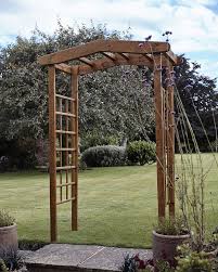 A metal or wooden garden arch adds the attractive characteristics of height and structure to the landscape by acting as a focal point on a lawn or along a path, it's also a handsome method of. Uk Garden Supplies Bilbury Wooden Garden Arch