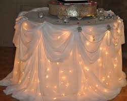 Lights Under The Table For The Wedding Cake Table It Just Reminds Me Of A Starry Country Night Wedding Wedding Cake Table Wedding Day