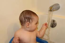 It's easiest to use the kitchen sink or a small plastic baby tub filled with warm water instead of a standard tub. How To Give A Baby A Bath 13 Steps With Pictures Wikihow