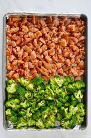 Foil Lined Baking Sheet With Diced Chicken Thighs And Broccoli Florets Sheet Pan Dinners Chicken Diced Chicken Broccoli Recipes