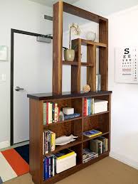 Dressing Room With Blue Carpeting And Dark Cabinetry Bookshelf Room Divider Living Room Divider Diy Room Divider