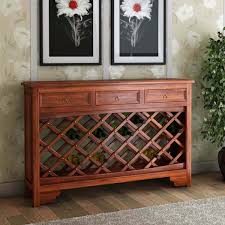 Both wide table top and open shelf provide spacious storage space to facilitate placing important necessities for easy access. Sierra Nevada Modern 3 Drawer Wine Console Table