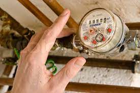 A Hand Of Man Checking A Water Meter | Stock Image | Colourbox