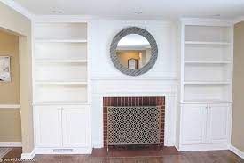 No matter what, a fireplace that comes with bookshelves features a perfect combination of coziness and a quality reading experience. White Built In Bookshelves Around The Fireplace Green With Decor