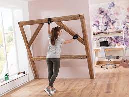 14 cm fachwerkwand, holzbalken auf der innenseite mit dachpappe(bitumen)versiegeln, 10 cm luftspalt, 20 cm gasbeton So Bauen Sie Fachwerkelemente Fur Innenraume Ratgeber Bauhaus