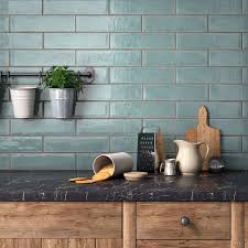 Blue Greens Are Trending Right Now And This Delicious Aqua Ceramic Tile Hits All The Right Notes W Blue Backsplash Kitchen Green Backsplash Kitchen Wall Tiles