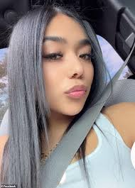 ICE agents are hit with horrific verbal abuse by teen girls as they drag  away migrant father in Chicago