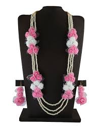 Baby shower flowers are important when planning a baby shower because they often take center stage. Buy Baby Pink Colour Baby Shower Flower Jewellery Online Anuradha Art Jewellery