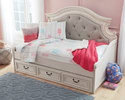 This ornately shaped headboard features an antique white finish that provides the perfect mix of traditional and cottage design elements. Realyn Twin Day Bed With Storage Rent To Own Day Beds A Rentals