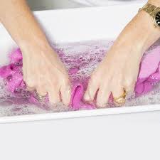 Most of the new clothes you buy will release some dye the first time you wash them. How To Hand Wash Clothes A 6 Step Guide The Laundress