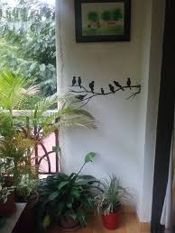 It doesn't matter if the balcony is large or small. I Wanted Birds In My Garden So I Just Painted Them On My Balcony Wall Garden Wall Painting Garden Wall Wall Paint Designs Creative