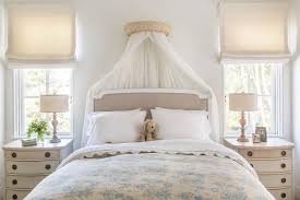 Canopy beds can be used in any interior design style. Gray Canopy Bed With Sheer Curtains Transitional Girl S Room