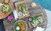 Mana Retreat Lombok | Enjoy food in Mana surrounded by lush gardens