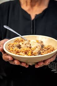 A delicate, flavorful dish that will satisfy vegans and carnivores alike! Palestinian Couscous With Chicken And Chickpeas Maftoul Couscous Dishes Couscous Recipes Middle East Food