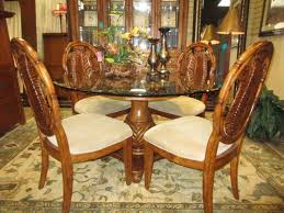 Cindy Crawford Glass Top Table On A Pedestal Base With Four Chairs The Chairs Have A Palm Leaf Back Subtle Tropic Dining Table Makeover Chair Glass Top Table