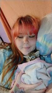 How to catch and care for a friendly cat and her 4 baby kittens?