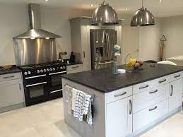 Steel gray granite countertops for kitchens. Grey Shaker Island With Steel Grey Leathered Granite Stainless Steel Island Lights Kitchen Supplied By Diy Kitchen Remodel Grey Kitchen Island Kitchen Design