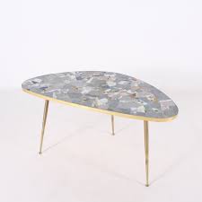 Supported by a sleek, geometric brass base and finished with a mango wood top, this coffee table balances powerful and elegant design. Mosaic Of Ceramic Solid Brass Coffee Table By Berthold Muller Oerlinghausen 1960 S 133358