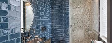 The beige shades of herringbone look just like a wooden floor, but it's all made from tile. Shower Floor Tiles Which Why And How Homify