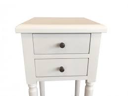 A round nightstand has a startlingly long history. White Bedside Table Small