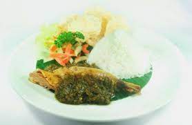 Bebek Bukittinggi Grilled Marinated Duck In Spicy Green Chili Sauce Served With Rice Pickles Emping