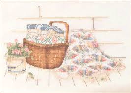 A collection of 12 cross stitch designs celebrating the patchwork quilt (leisure arts #2539). Paula Vaughan Cross Stitch Designer