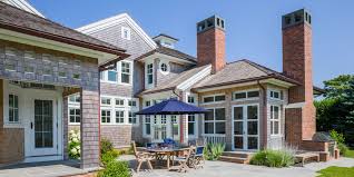 Stone Patio Landscape Shingle Exterior Warm Welcome Cape Cod Custom Coastal Home Shingle Exterior Shingle Style Homes Beach House Exterior